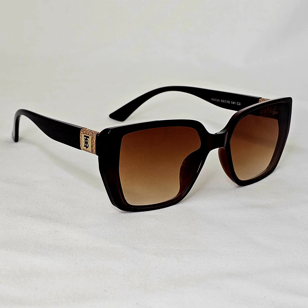 Burberry Crystal Monogram Cat-Eye Sunglasses.