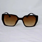 Burberry Crystal Monogram Cat-Eye Sunglasses.