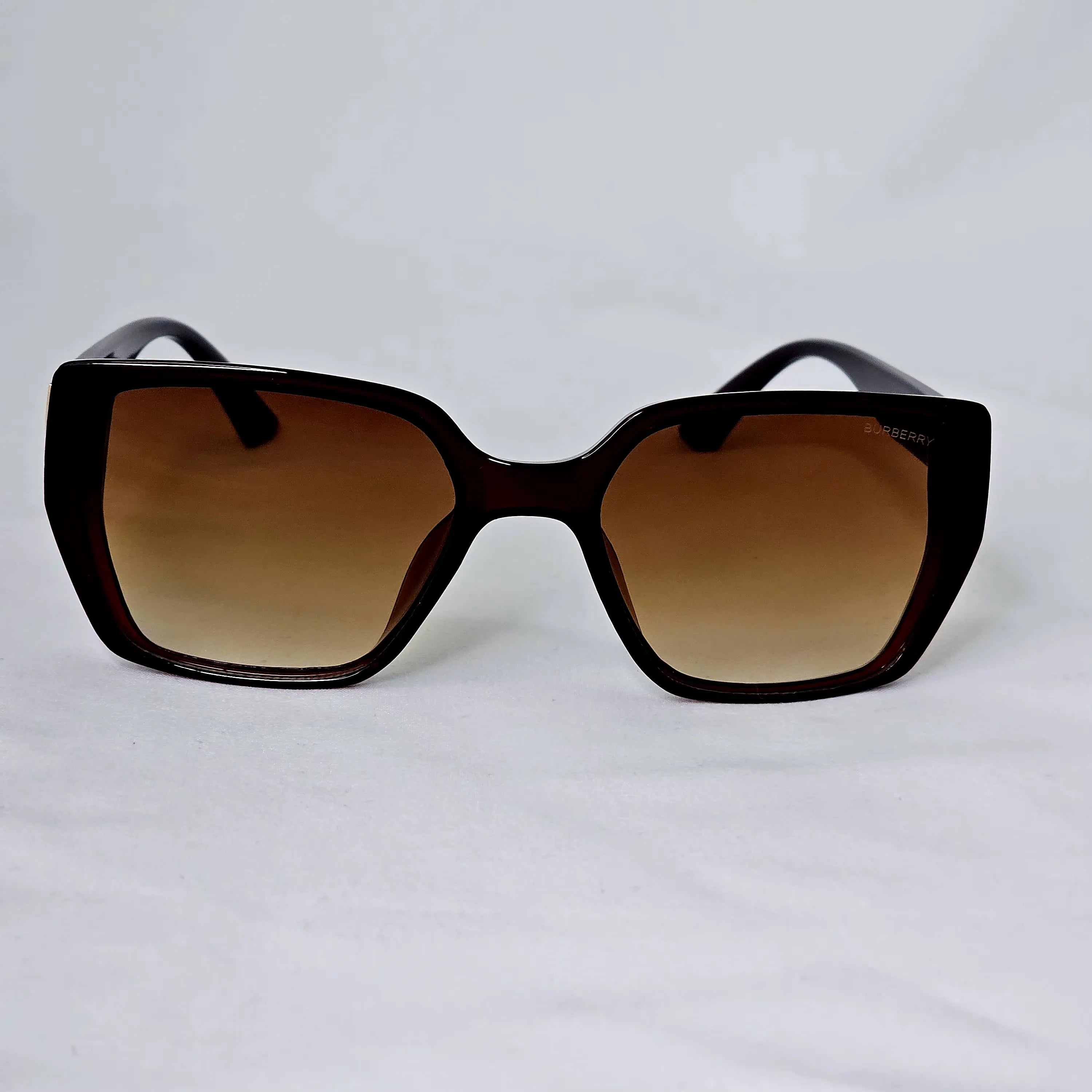 Burberry Crystal Monogram Cat-Eye Sunglasses.