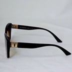 Burberry Crystal Monogram Cat-Eye Sunglasses.