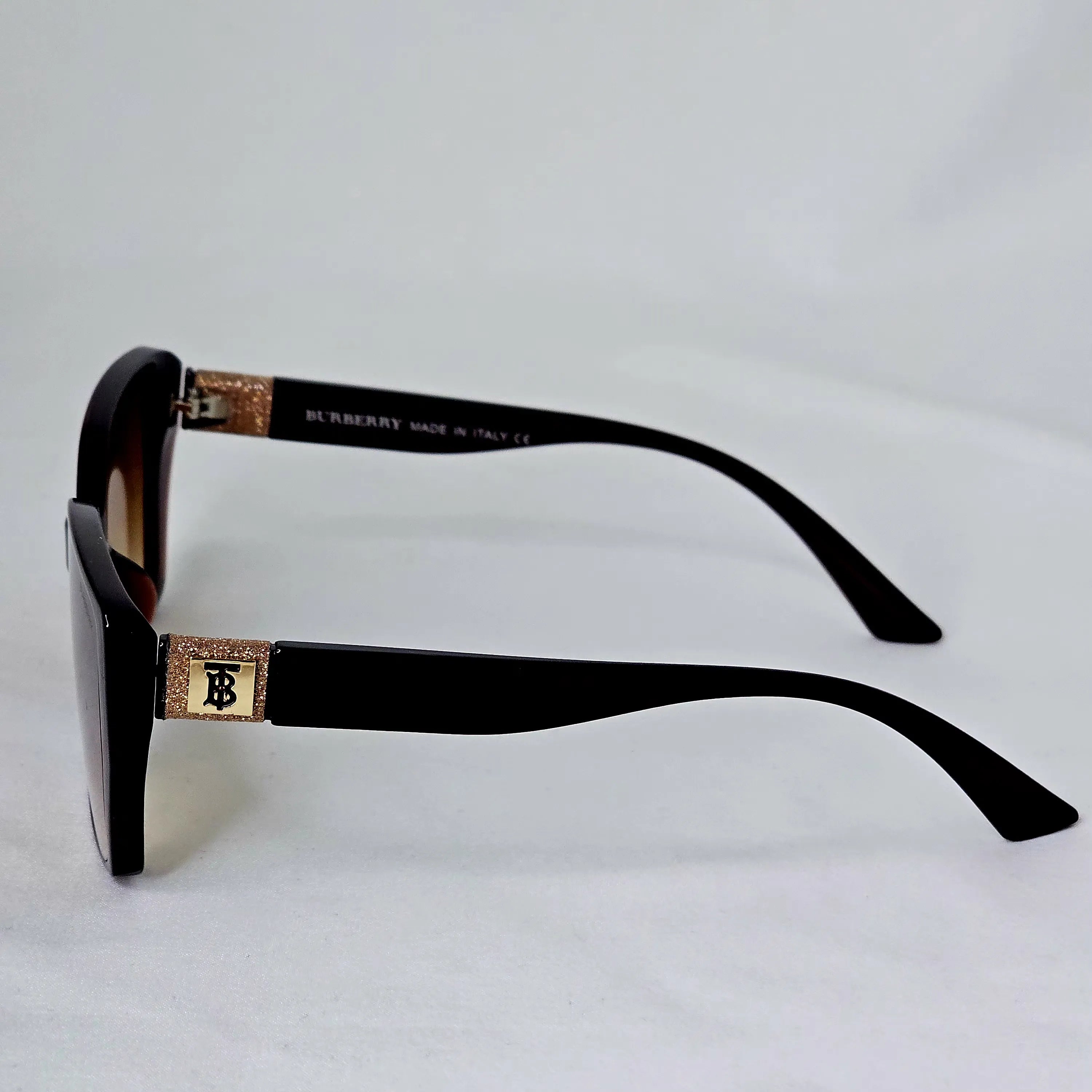 Burberry Crystal Monogram Cat-Eye Sunglasses.