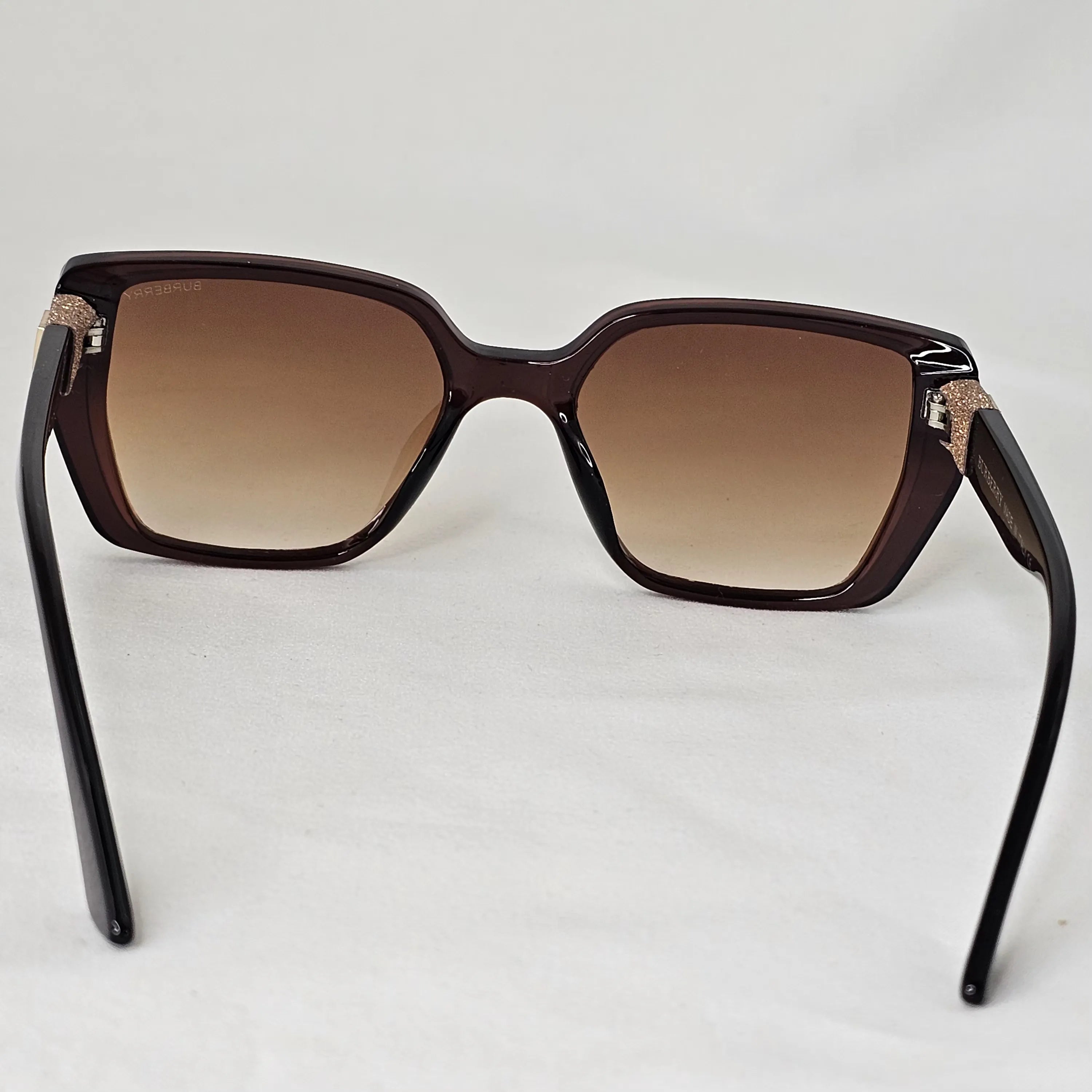 Burberry Crystal Monogram Cat-Eye Sunglasses.
