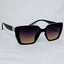Burberry Crystal Monogram Cat-Eye Sunglasses.