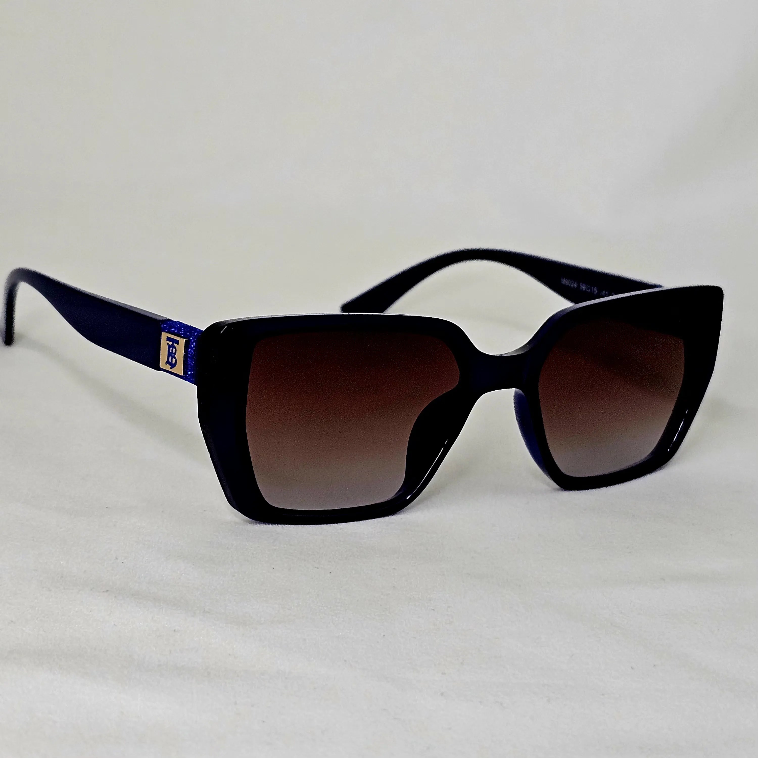 Burberry Crystal Monogram Cat-Eye Sunglasses.