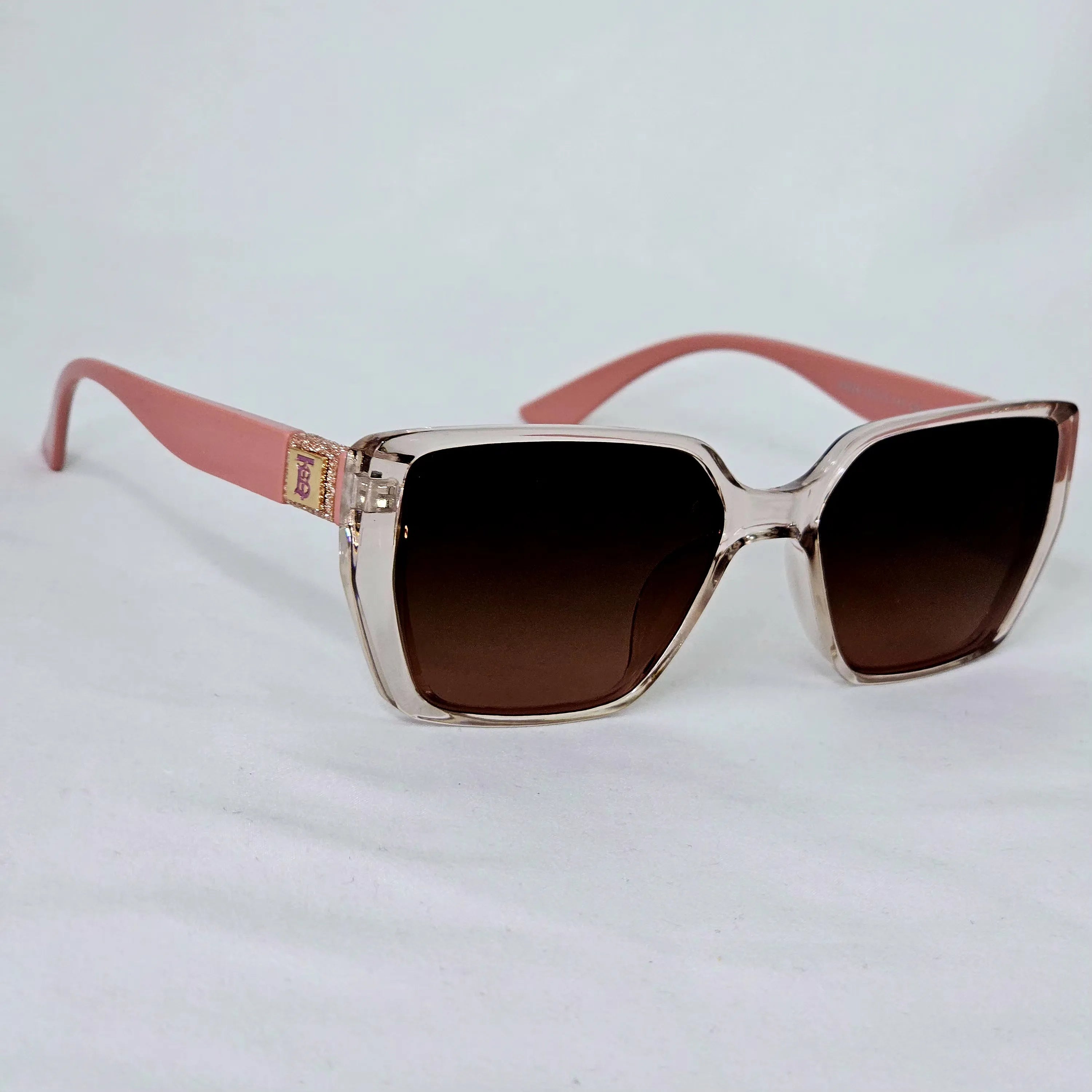 Burberry Crystal Monogram Cat-Eye Sunglasses.